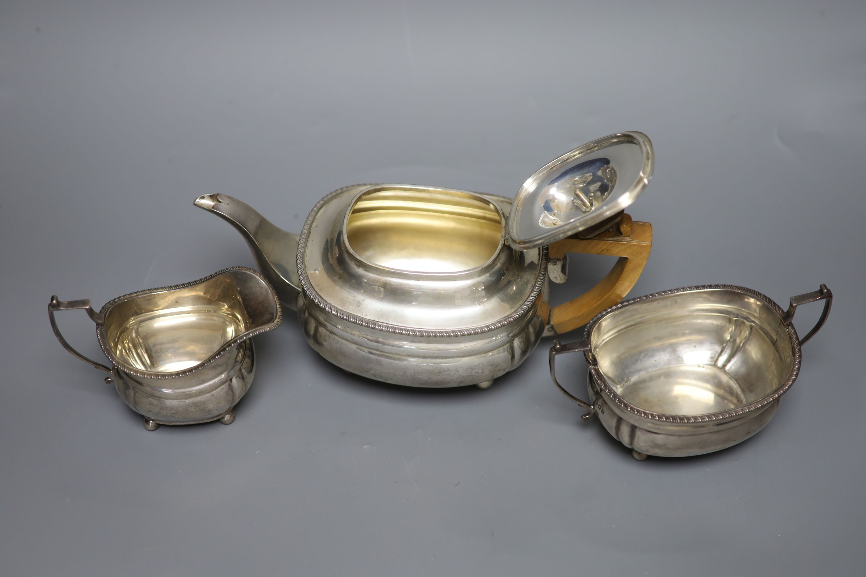 A George V three piece silver tea set, Harrod's Ltd, London, 1920/1